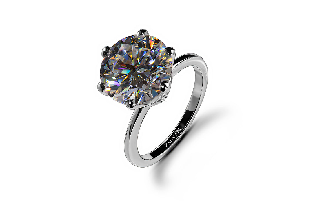 A 5-carat Moissanite ring, which serves as an alternative to a diamond, crafted in a 925 sterling silver band with the brand "ZANVARI" inscribed inside.