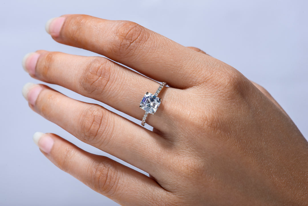 Model wearing Asscher Cut moissanite an alternative for diamond engagement ring 