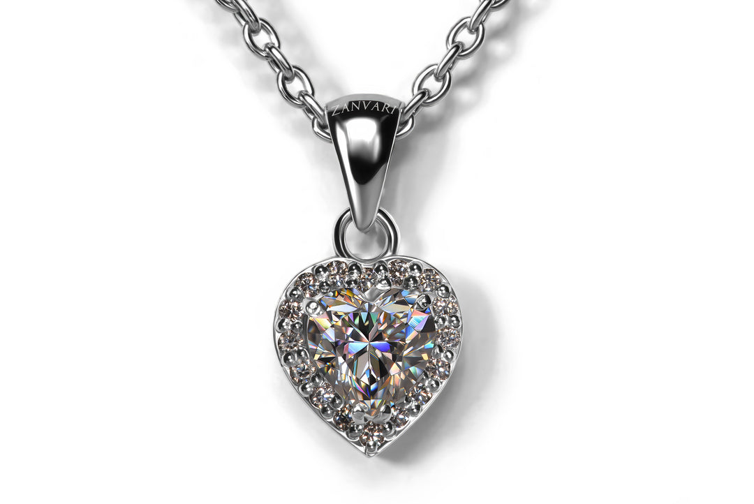 Heart-shaped moissanite diamond substitute pendant in 925 silver with smalll side moissanite stones handmade by skilled craftsmen at Zanvari