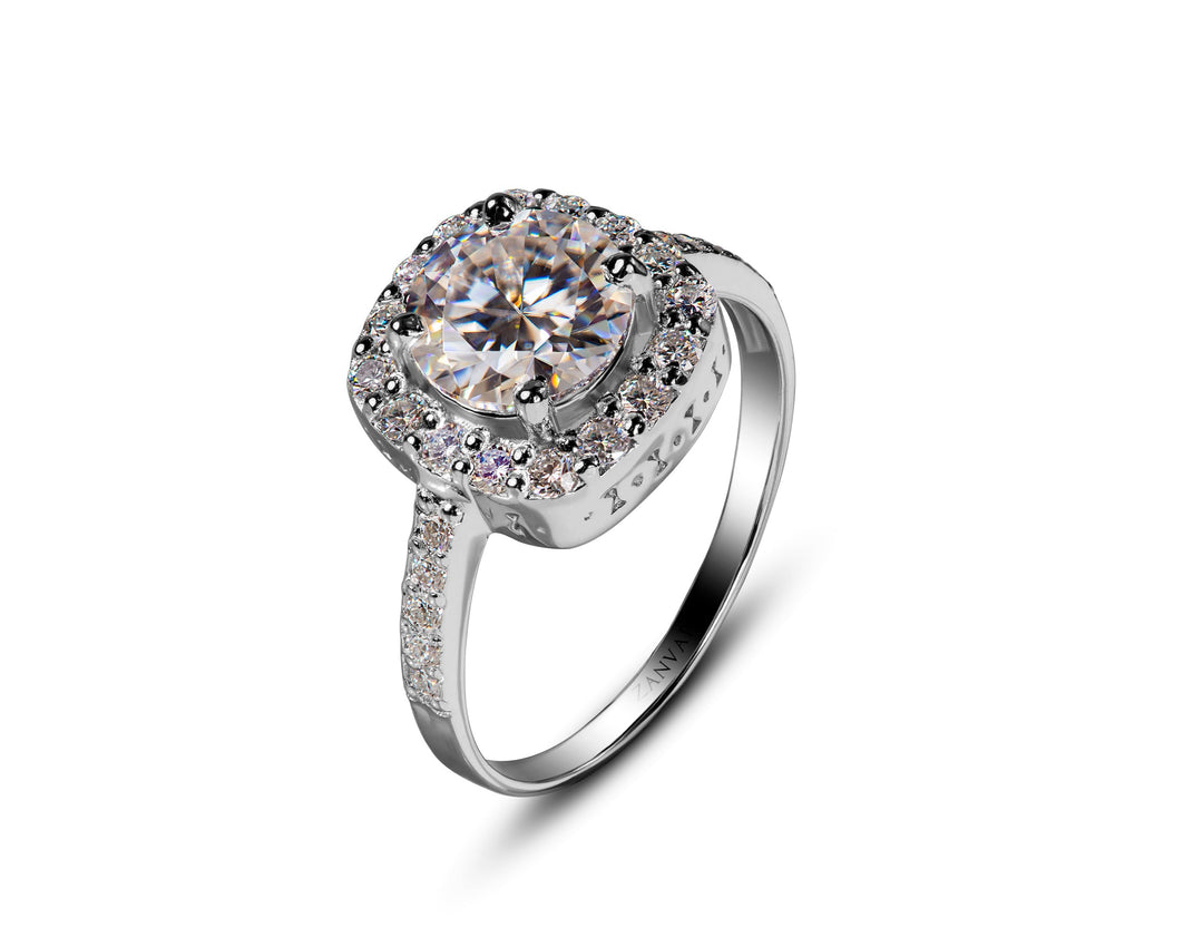 A sparkling Moissanite stone set in a 925 silver ring with a halo and band adorned with smaller accent stones.