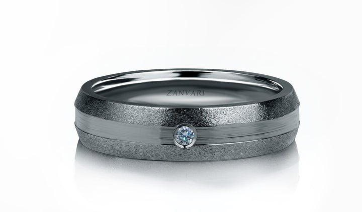 Silver ring with a diamond on a white background handmade