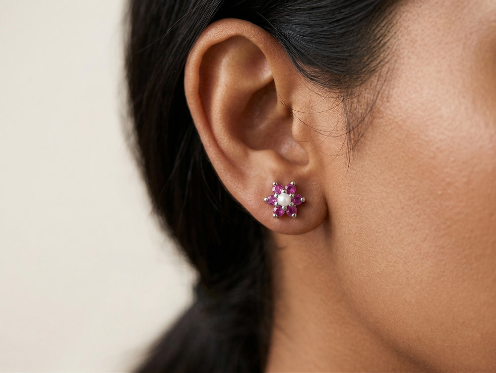 Natural ruby studs in 935 silver