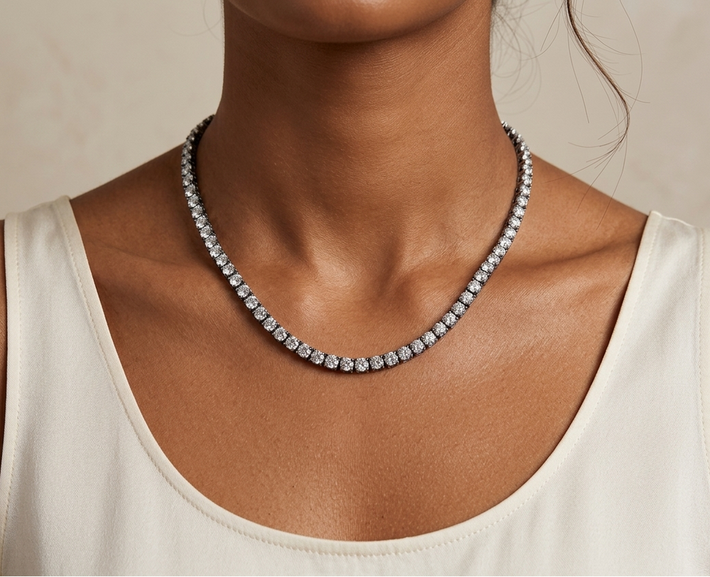  moissanite silver tennis necklace worn by a person against a neutral background