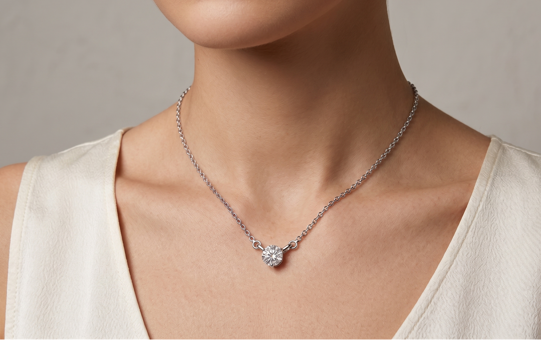 Model wearing The Sophisticated Stone of Moissanite Necklace by Zanvari Pakistan — D/VVS1 moissanite pendant on an 18-inch sterling silver chain.