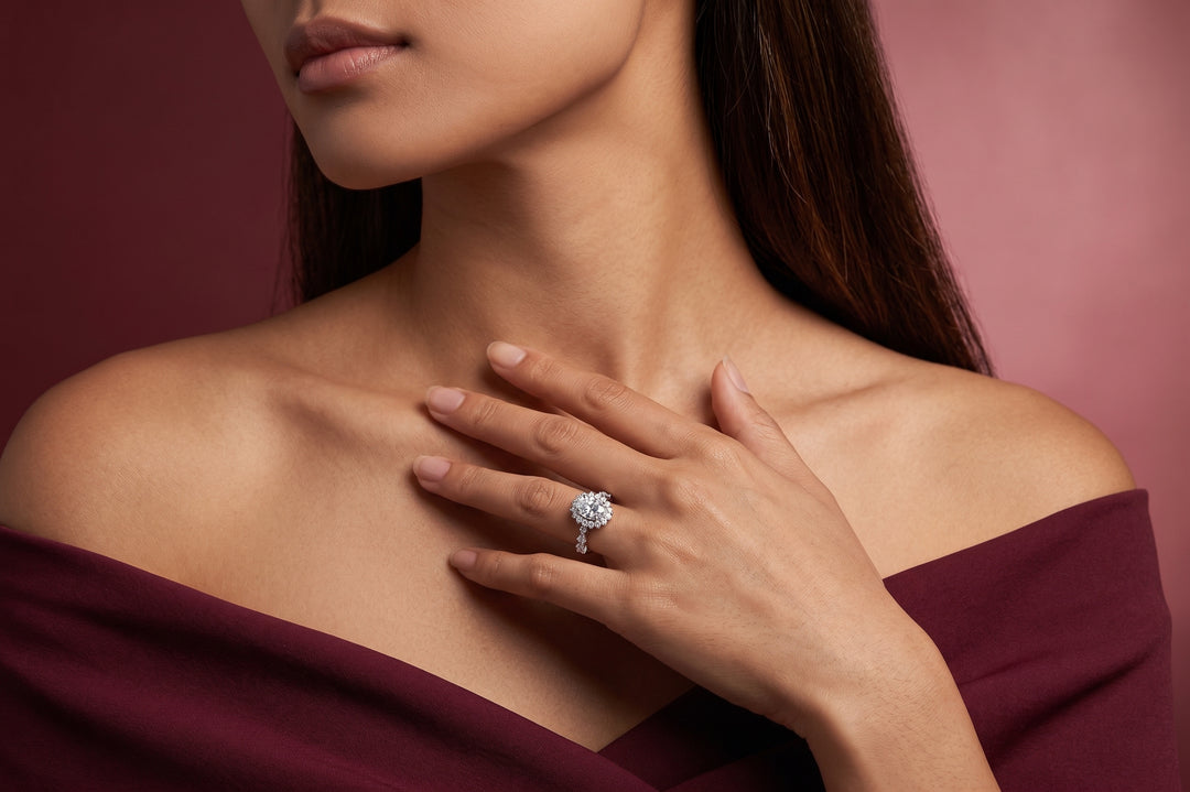 Model wearing oval cut moissanite ring in 925 silver