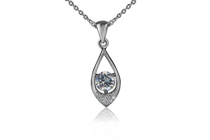 Teardrop-shaped diamond pendant on a chain against a white background