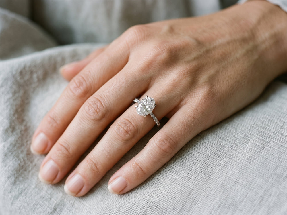 Model wearing 925 silver oval cut moissanite ring