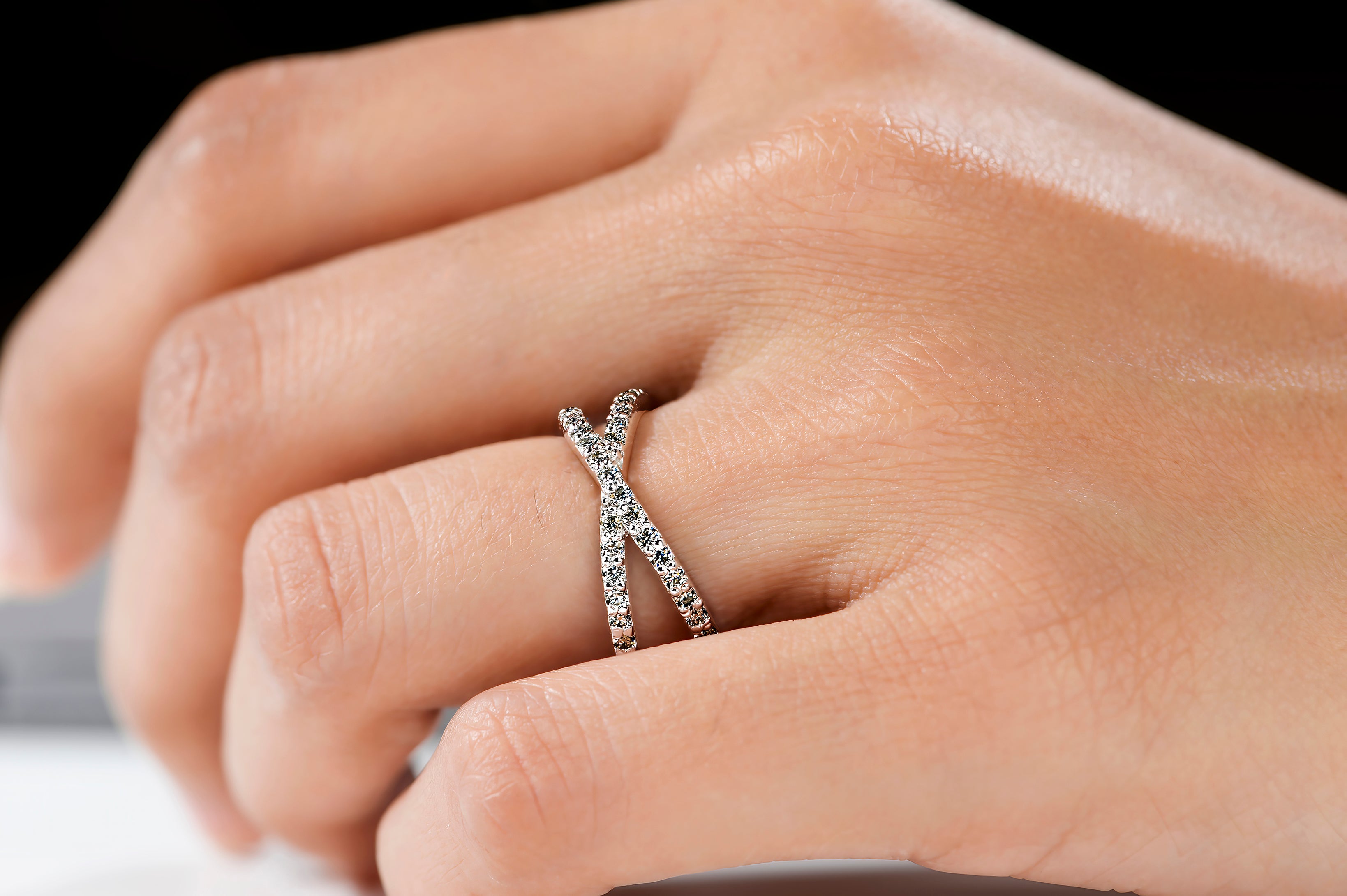 Criss-Cross Moissanite Ring in Sterling Silver 925  worn by a model gracefully