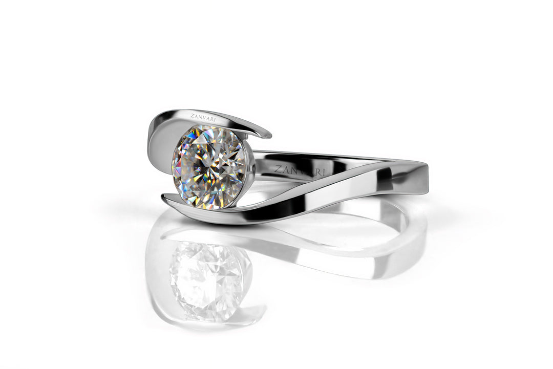  A white gold plated silver ring with a round brilliant cut cut moissanite an alternative for diamond.