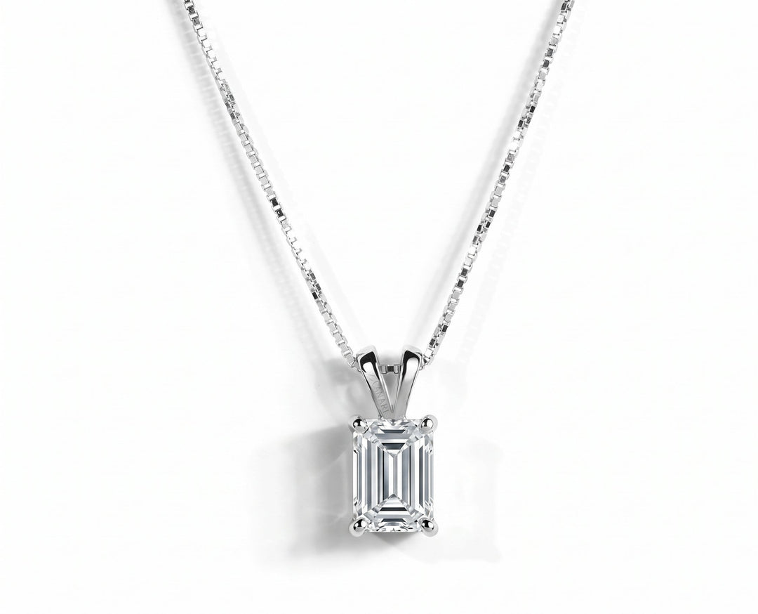 Eco Wonder Necklace by Zanvari — 1ct emerald cut moissanite solitaire pendant with four corner prongs on a 925 sterling silver box chain