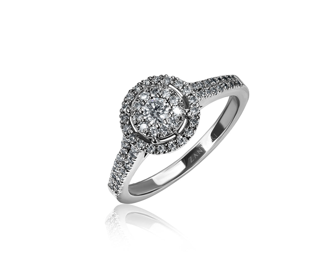 Silver ring with moissanites embedded for cluster shine on a white background