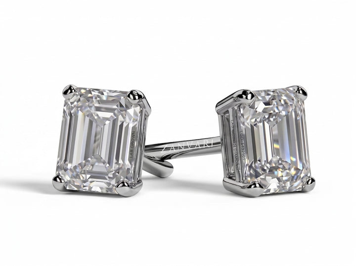 1ct lab-grown emerald cut diamond stud earring worn on the ear, rhodium-plated sterling silver setting, Zanvari