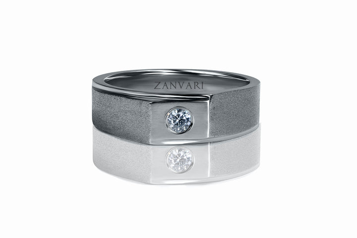 Silver ring with a diamond on a white background, featuring the brand 'Zanvari'.