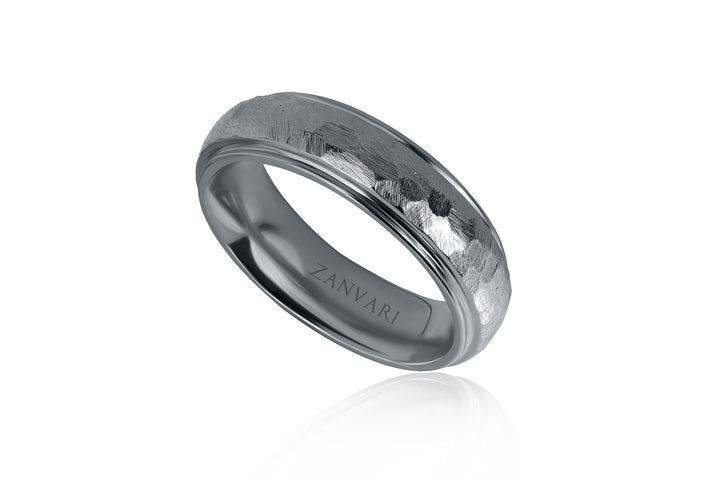Silver ring with 'Zanvari' engraving on a white background