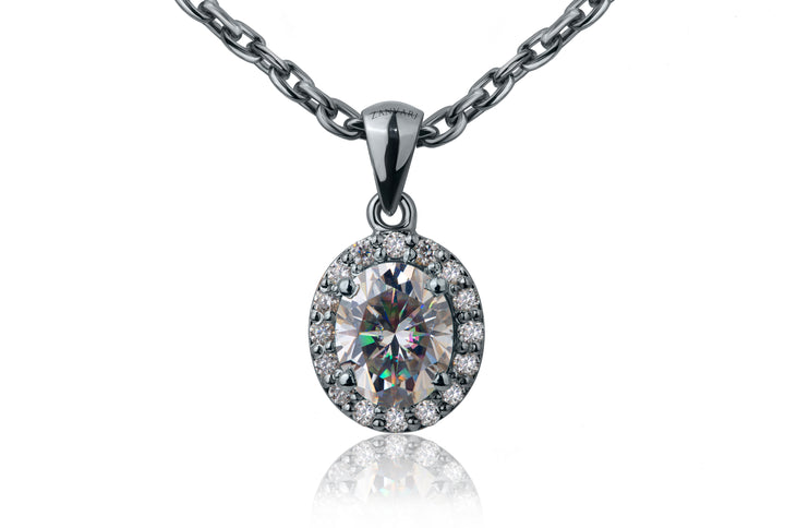 4 carat oval shaped moissanite in 925 silver with accent moissanite and sterling silver chain handcrafted by Zanvari's skilled craftsmen 