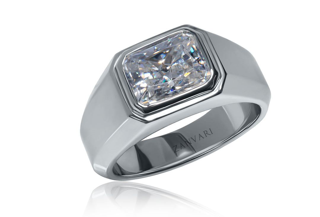 Silver ring with a 4 carat radiant cut moissanite  on a white background