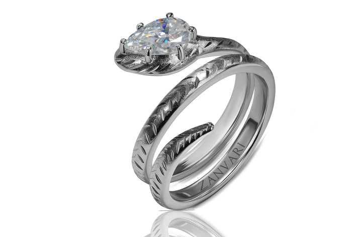 Snake inspired solitaire ring handcrafted in 925 sterling silver with textured serpent design and brilliant moissanite stone by Zanvari”