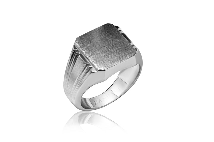 Signet Silver ring with a textured surface on a white background