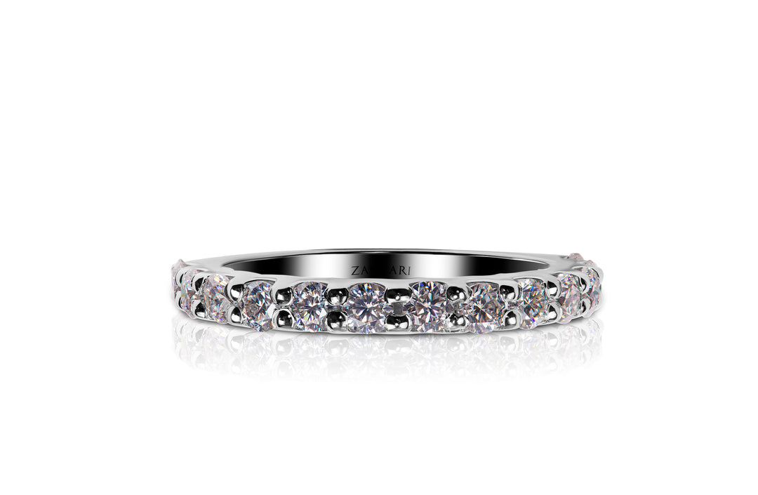 A 925 silver ring by ZANVARI, showcasing a row of sparkling Moissanite stones in a sleek, elegant band.