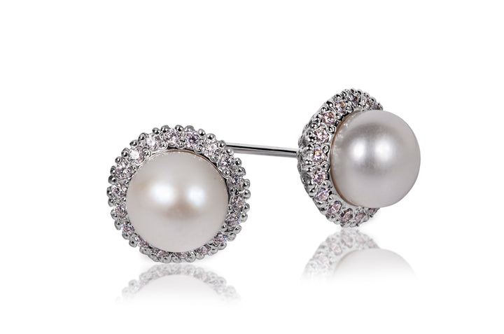 Ocean's Grace Pearl Studs by Zanvari — 8mm natural freshwater pearl with 1.5mm zirconia in 925 sterling silver with rhodium plating, Pakistan.