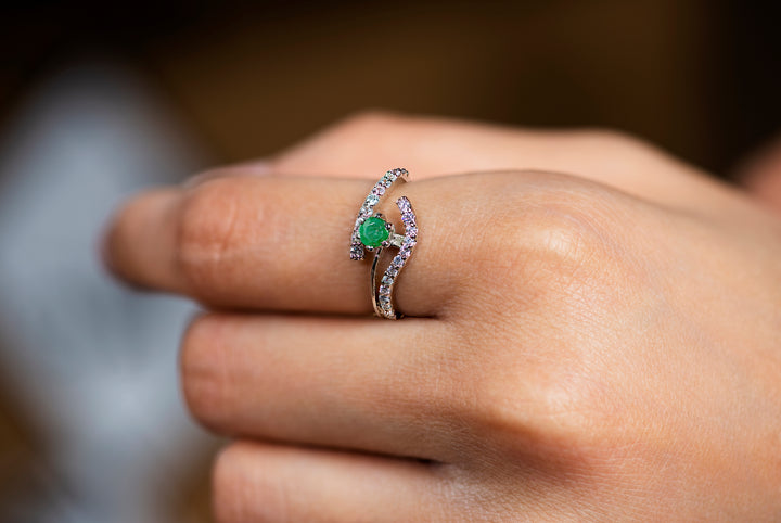 INFINITY KNOT EMERALD RING